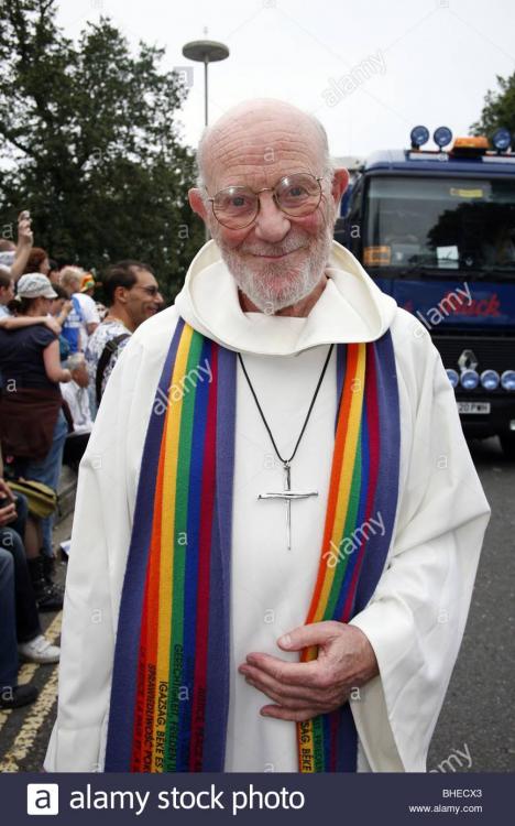 rainbow-stole-and-cross-on-a-priest-at-brighton-and-hove-gay-pride-BHECX3.jpg
